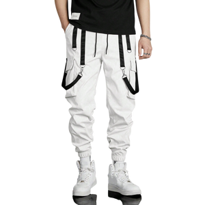 Model wearing white techwear jogger pants with black straps and cargo pockets, styled in Japanese streetwear fashion

