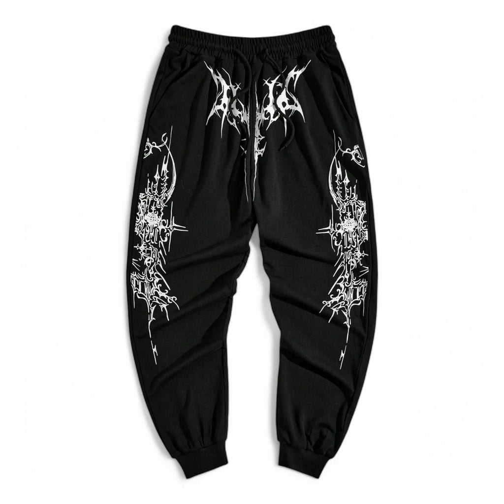 Black jogger pants with Halloween-themed floral and spooky graphic print, styled in Japanese streetwear fashion