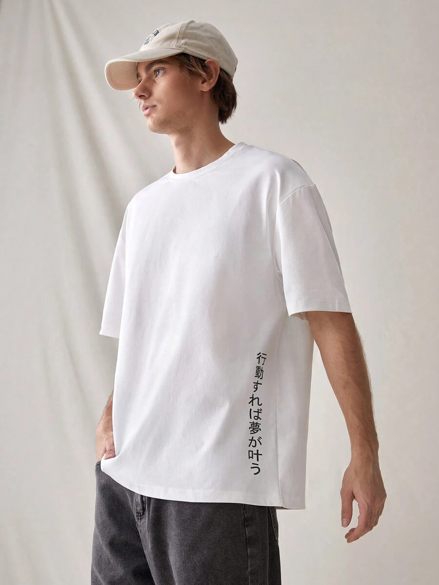 Tokyo oversized streetwear T-shirt with Japanese graphic print, slogan, and loose drop-shoulder fit