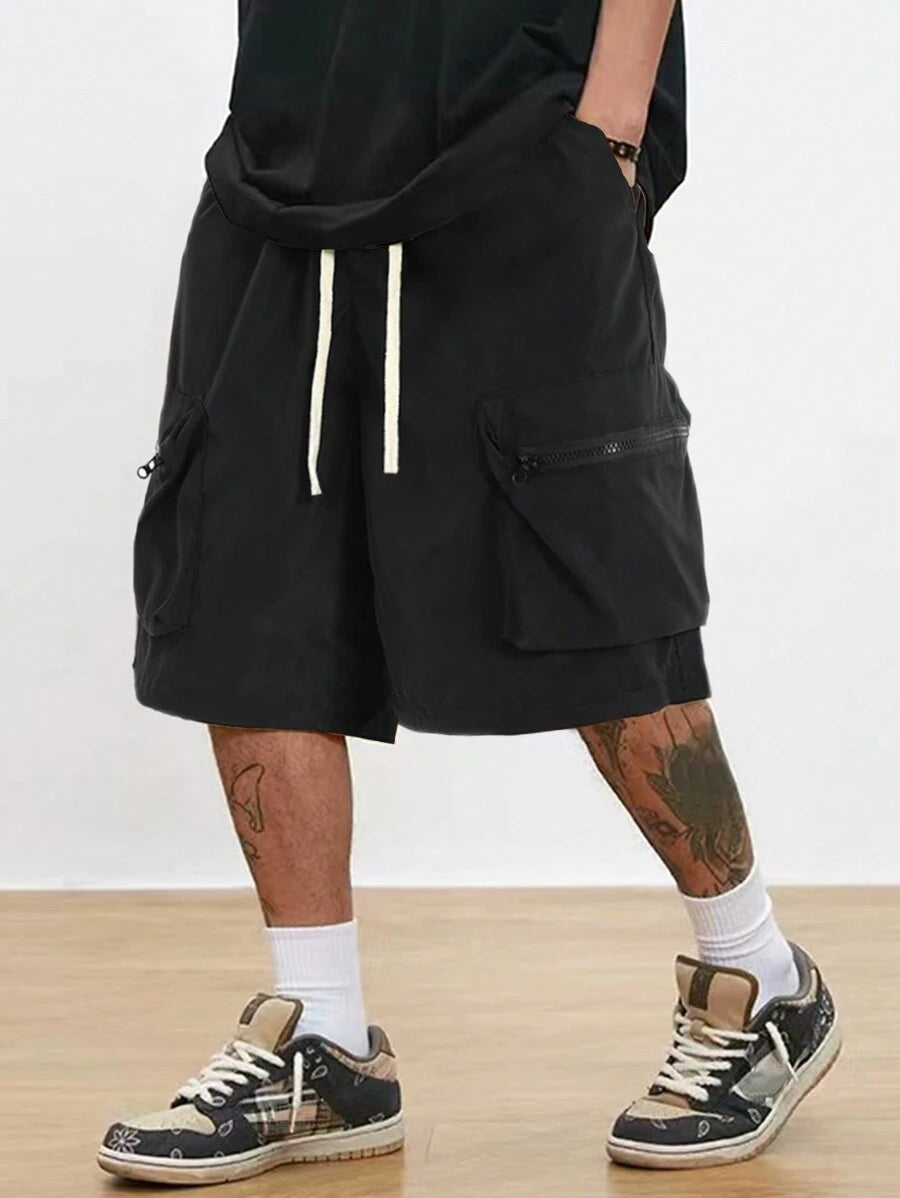 Men’s black hip-hop cargo shorts with drawstring waist and oversized zippered pockets – loose streetwear style