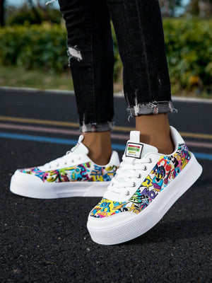 Colorful graffiti street sneakers with white base and comic-style print, lace-up low tops with EVA sole