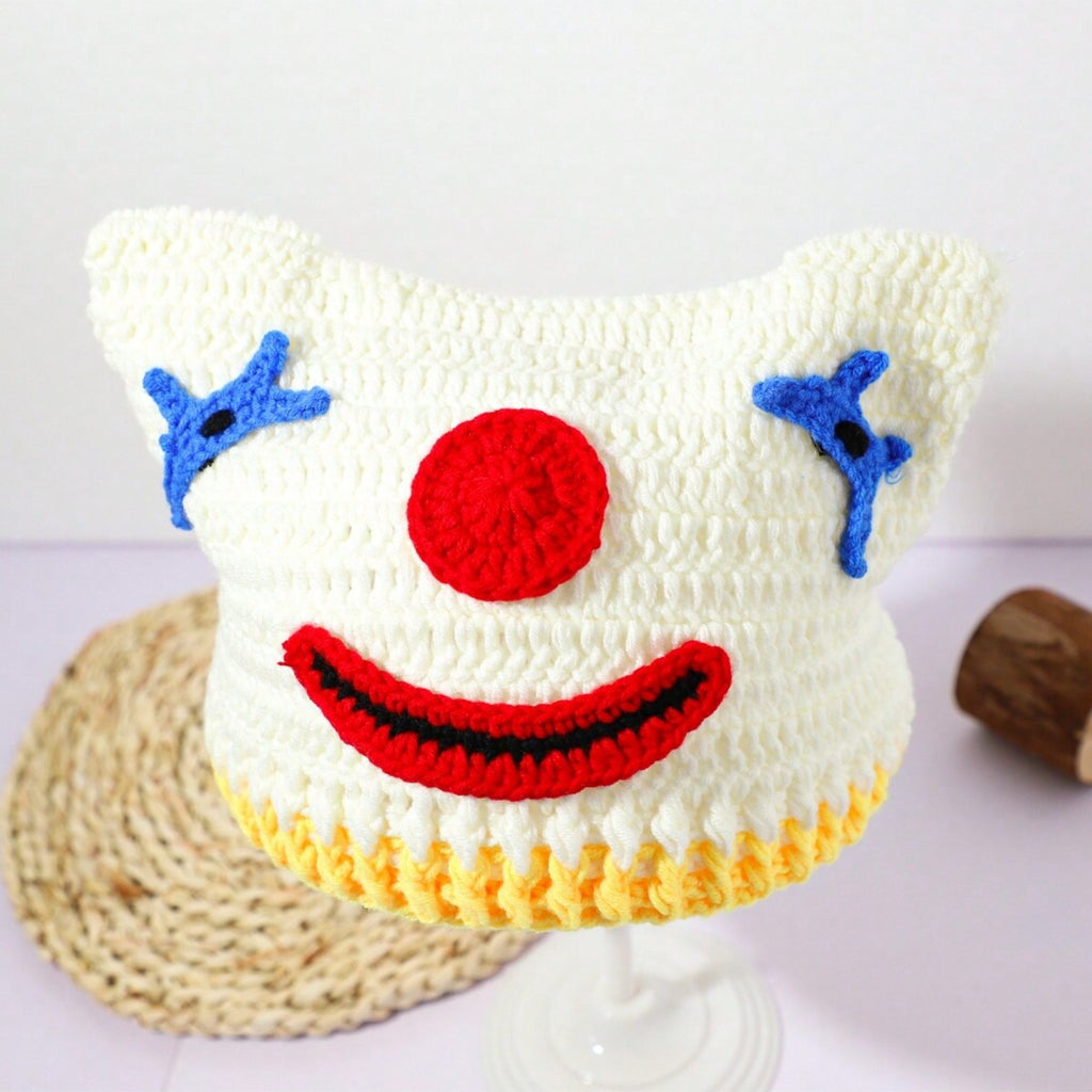 Hand-crocheted clown face beanie for women with red nose and blue stitched eyes, Halloween streetwear knit hat