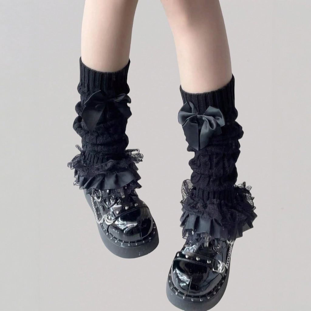 a cozy kawaii dream with these ruffle bow leg warmers – gothic and cute.
