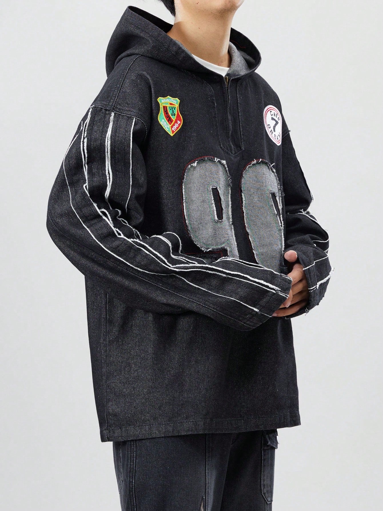 Black denim hoodie with vintage ‘90’ patch and slogan – Japanese streetwear with athletic grunge style
