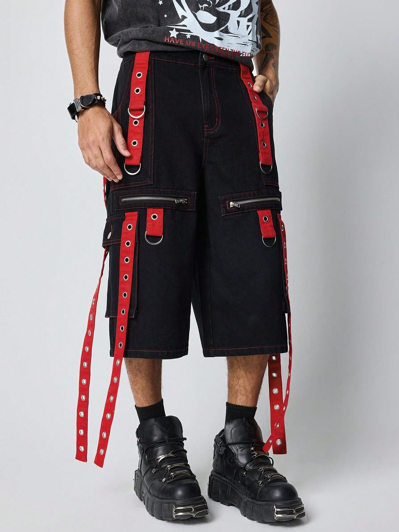 Black and red denim Bermuda shorts with straps, zippers, and pocket details – Japanese streetwear style