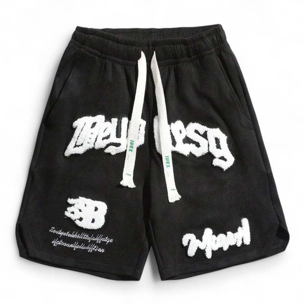 Men’s basketball-style black graphic track shorts with 3D letter patches and drawstring waist – urban streetwear

