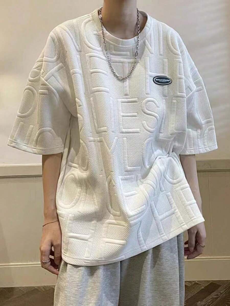 Japanese streetwear embossed letter tee white oversized drop shoulder t-shirt Harajuku fashion
