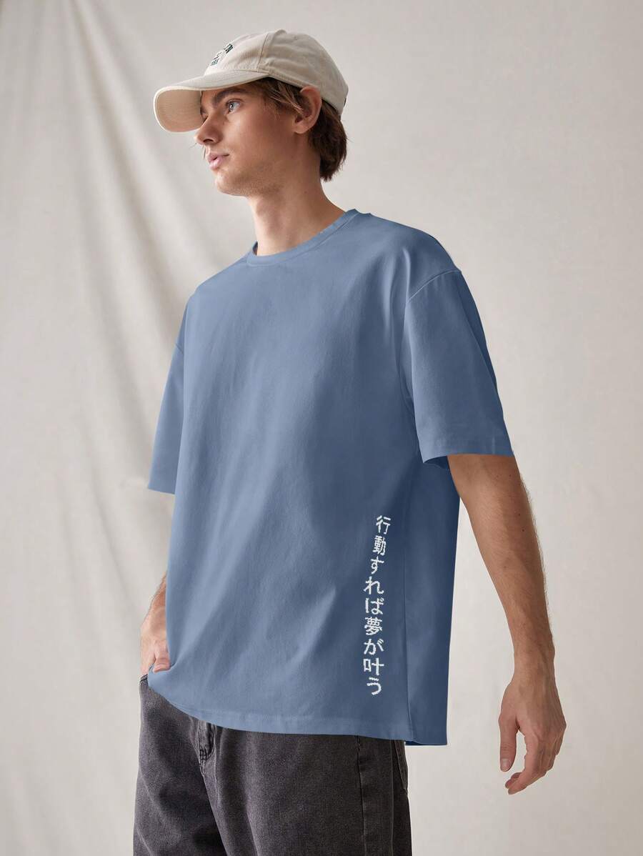 Tokyo oversized streetwear T-shirt with Japanese graphic print, slogan, and loose drop-shoulder fit