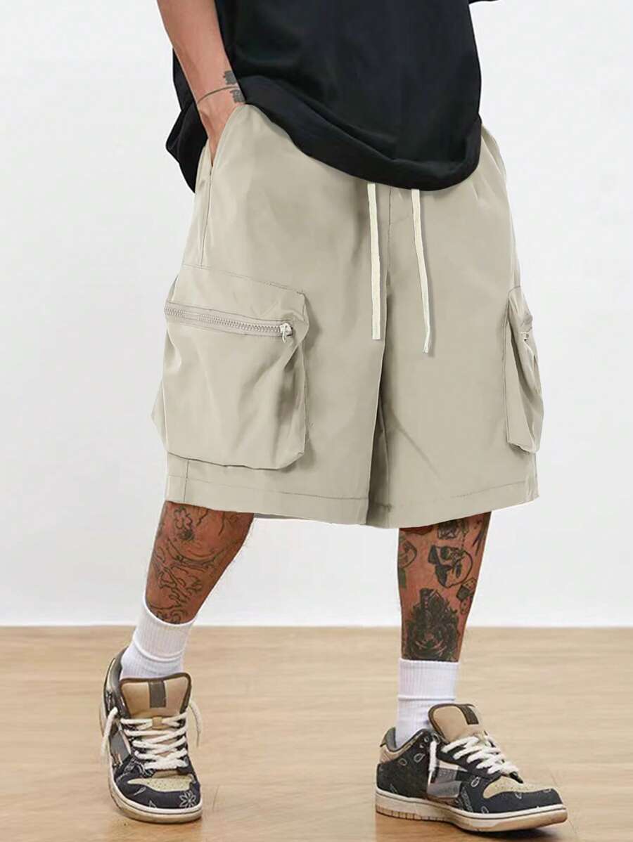 Men’s black hip-hop cargo shorts with drawstring waist and oversized zippered pockets – loose streetwear style