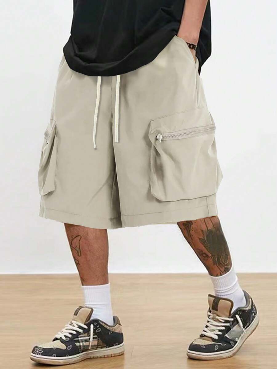 Men’s black hip-hop cargo shorts with drawstring waist and oversized zippered pockets – loose streetwear style