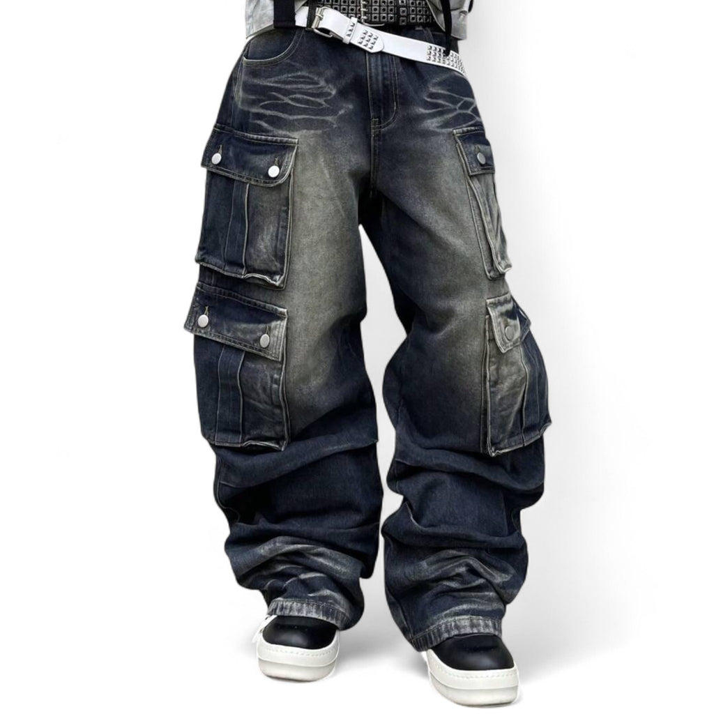 Japanese streetwear cargo jeans in black faded denim with oversized utility pockets and avant-garde wide leg design