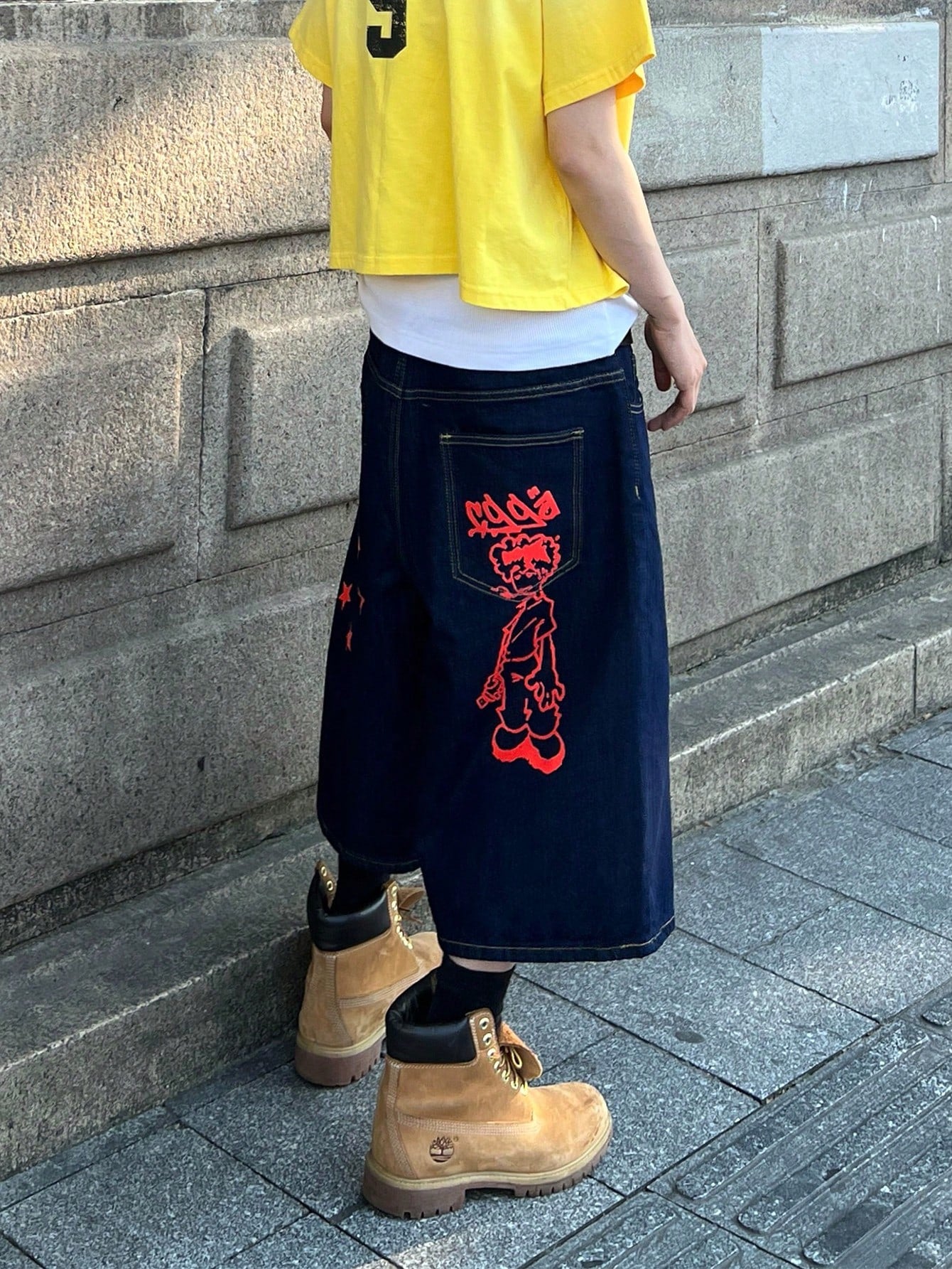 Blue denim Bermuda shorts with red cartoon graffiti and star graphics – Japanese hip-hop streetwear style