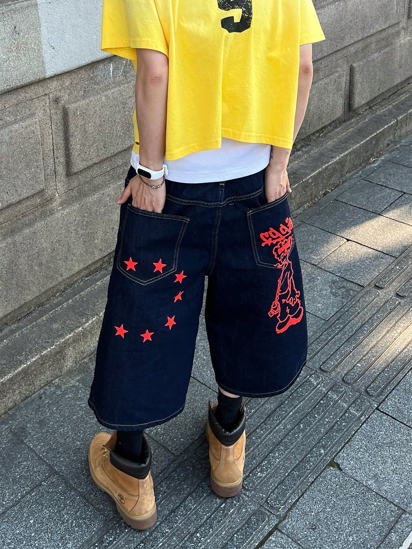 Blue denim Bermuda shorts with red cartoon graffiti and star graphics – Japanese hip-hop streetwear style