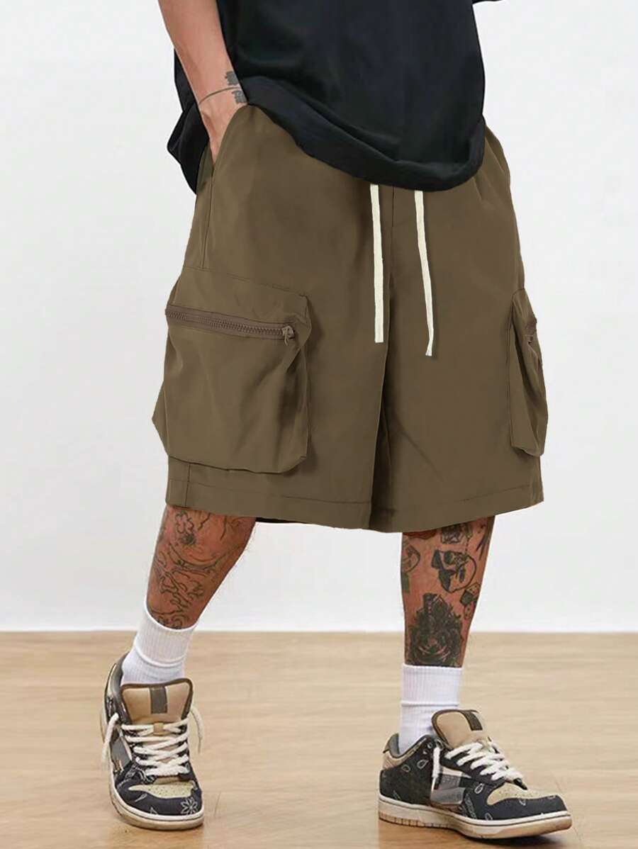 Men’s black hip-hop cargo shorts with drawstring waist and oversized zippered pockets – loose streetwear style