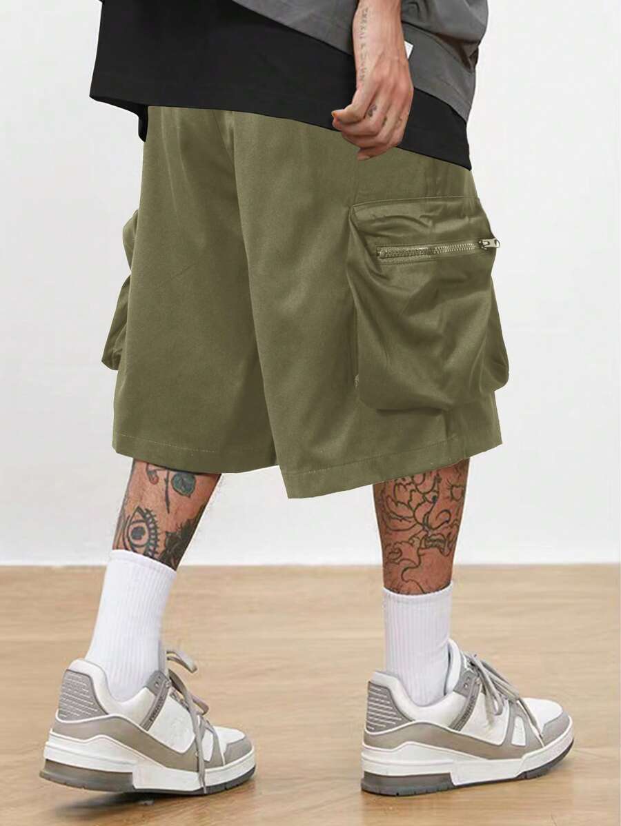 Men’s black hip-hop cargo shorts with drawstring waist and oversized zippered pockets – loose streetwear style