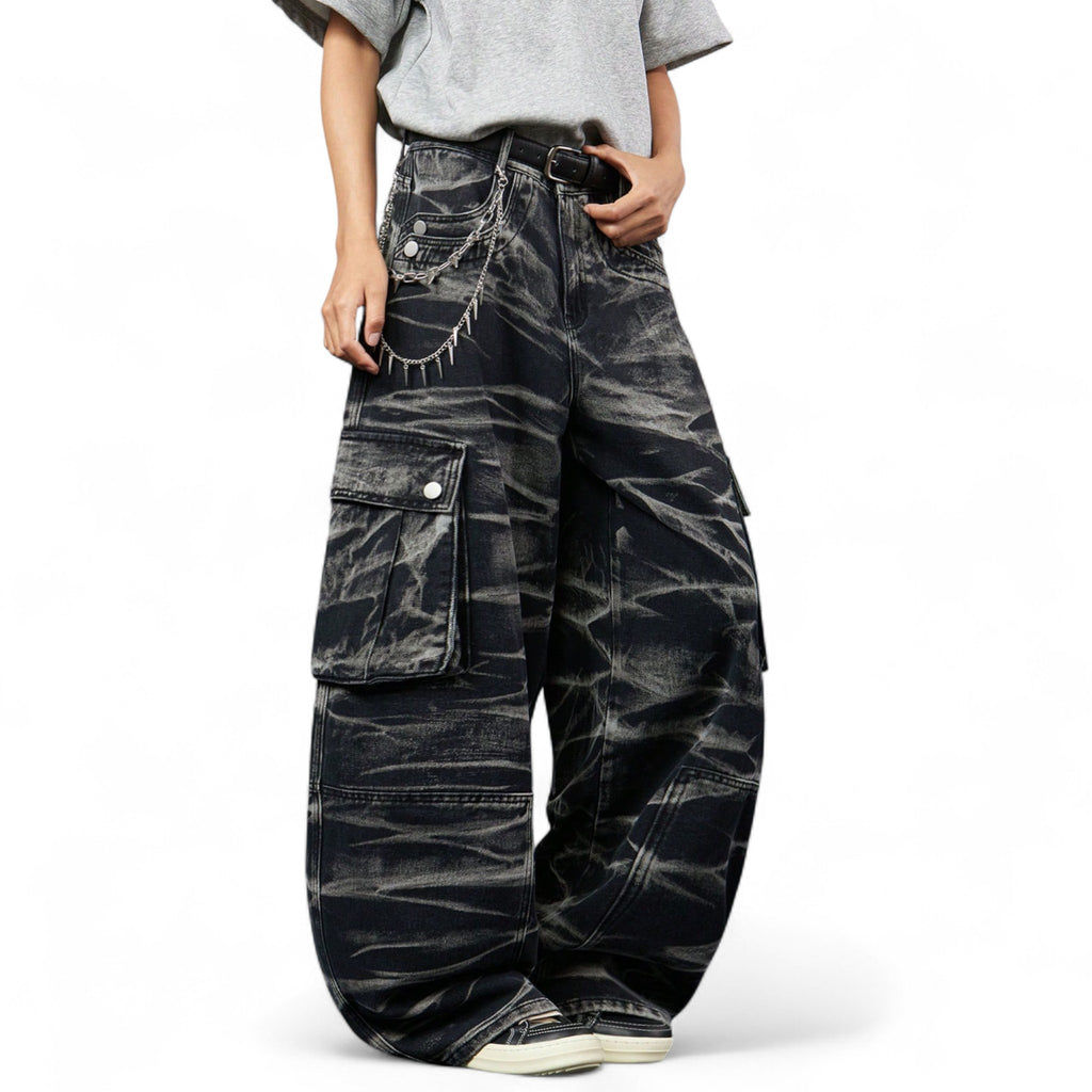 Japanese streetwear cargo jeans in washed black denim with oversized wide leg and utility pockets